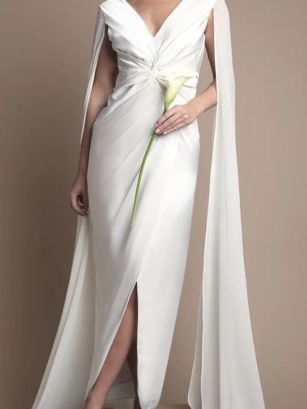 Sleek White V-Neck Wedding Dress with Draped Cape Detail
